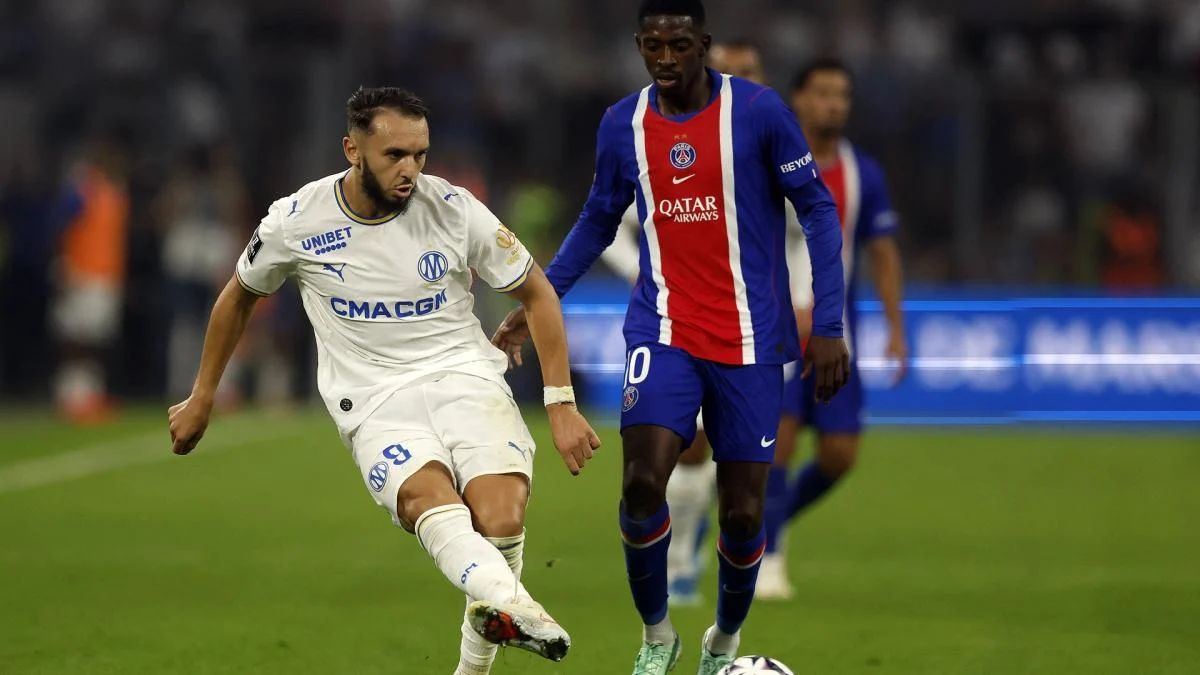 Amine Gouiri terjatuh di kotak penalti PSG saat laga Le Classique OM vs PSG